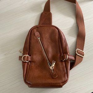 brown sling bag